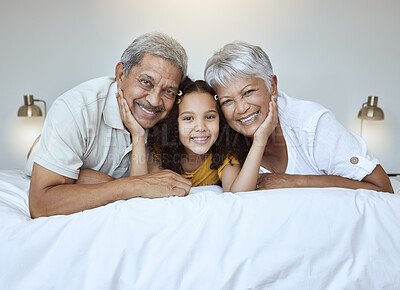 Buy stock photo Girl, grandparents and smile on bed for portrait, together and bedroom for bonding, love and happy in home. Elderly, man and woman with child for happiness, embrace and care in room at family house