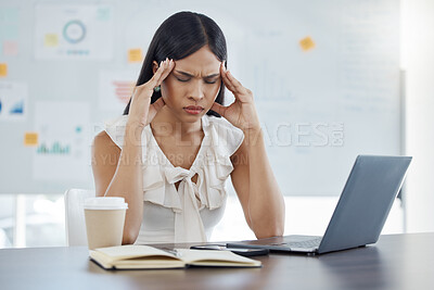 Buy stock photo Headache, stress and burnout with a business woman at work on a laptop at a desk in her office. Computer, compliance and mental health with a female employee suffering from a migraine while working