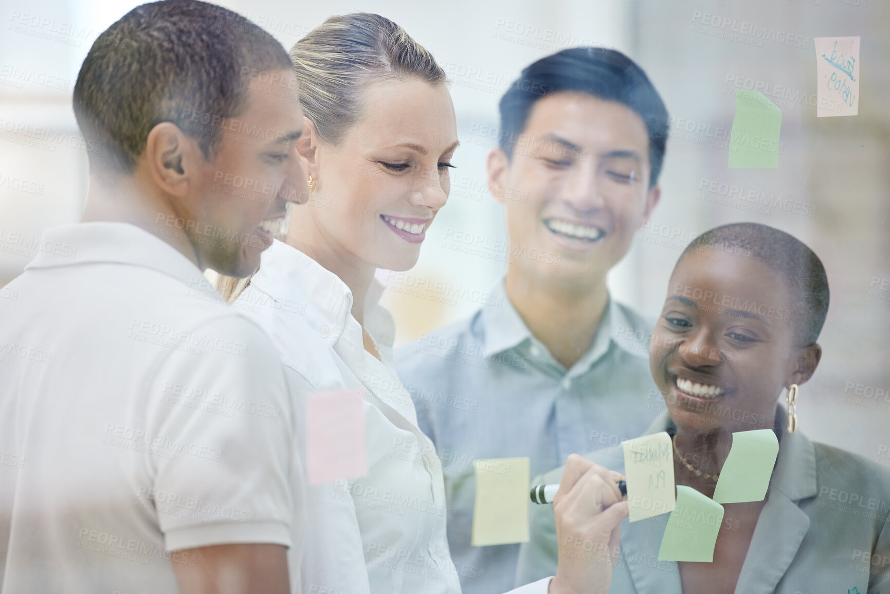 Buy stock photo Teamwork, sticky note and collaboration while writing idea and employees planning strategy for innovation, vision and goals in office meeting. Diversity team working on schedule for marketing project