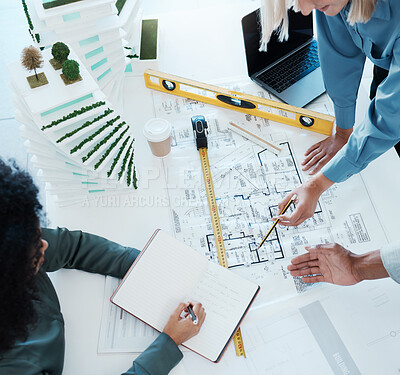 Buy stock photo Architect, paper and blueprint with meeting, planning and woman with model, book or writing. Building, document or notebook in design, development or property for team in office for architecture