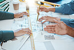 Hands, architect teamwork and design blueprint for building, architecture or construction project. Engineers, collaboration and group planning development project on drawing sketch with tape measure
