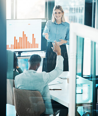 Buy stock photo Finance, meeting and presentation with a business woman answering a question in the boardroom. Teamwork , data and information with a female employee training or coaching her team in the office