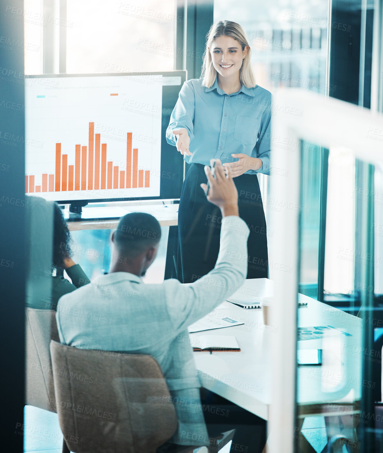 Buy stock photo Finance, meeting and presentation with a business woman answering a question in the boardroom. Teamwork , data and information with a female employee training or coaching her team in the office