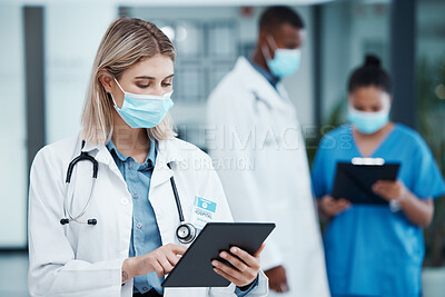 Buy stock photo Covid, doctor woman and tablet for results, prevention and check on patients charts online. Telehealth, female and staff with masks, for healthcare and treatment illness, scroll for cure and research
