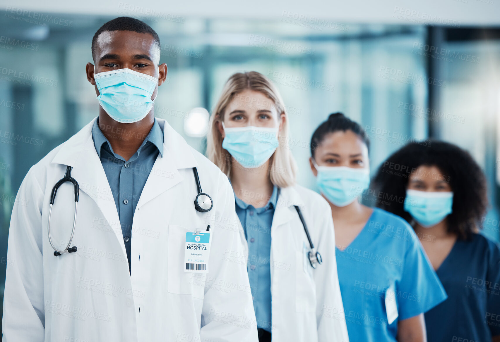 Buy stock photo Covid, medical doctors and team working in healthcare, consulting and in collaboration together at a hospital. Group of medicine workers with face mask for safety from virus in a row at a clinic