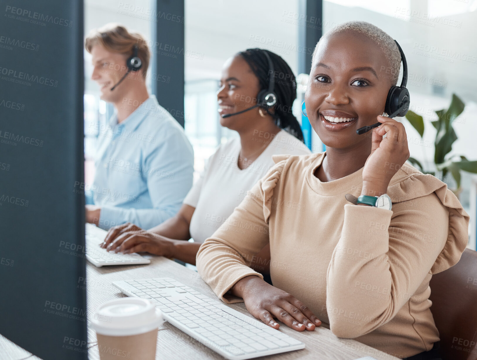 Buy stock photo Call center, customer service and crm with a black woman consultant working with her team in the office. Contact, ecommerce and contact us with a female telemarketing employee at work with colleagues