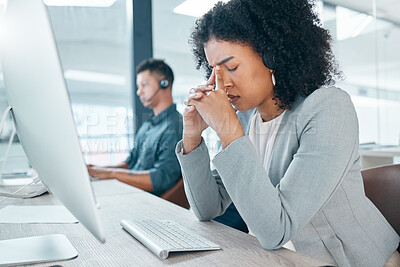 Buy stock photo Call center, headache and worker with stress while consulting, working and thinking with burnout at telemarketing company. Sad, frustrated and customer service employee with depression working in crm