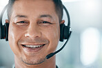 Call center, face portrait and man in customer service smiling and working in office. Crm, contact us and consulting agent at work with headset and friendly smile for support, help and telemarketing