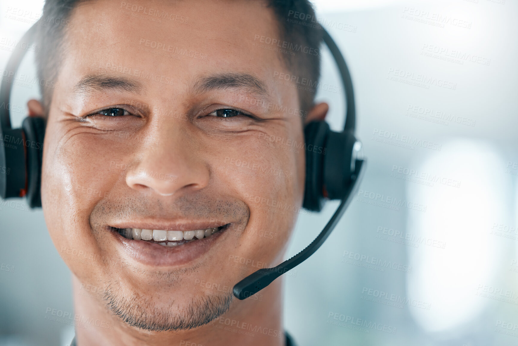 Buy stock photo Call center, face portrait and man in customer service smiling and working in office. Crm, contact us and consulting agent at work with headset and friendly smile for support, help and telemarketing