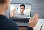 Business people wave in a video call meeting via laptop networking, talking and planning a development project. Smile, communication and Asian employee in a b2b partnership with a corporate manager
