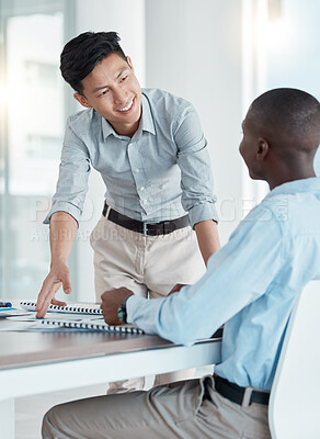 Buy stock photo Teamwork, strategy and planning with african and asian business people talking work in the boardroom. Meeting, collaboration and training with a male employee and colleague working in the office