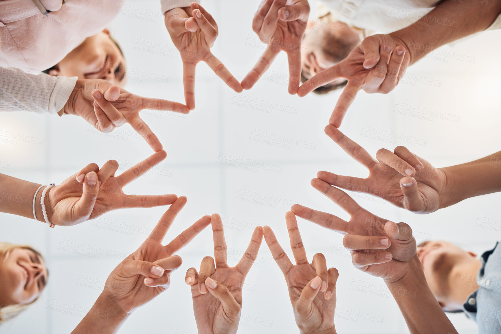 Buy stock photo Star, peace and hands of business people with community, collaboration and teamwork from below in an office. Team building, solidarity and corporate employees with a shape for support and motivation