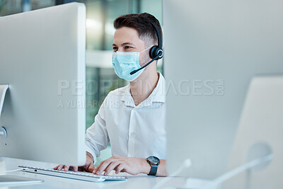 Buy stock photo Covid, call center and male consultant offering helpful customer service advice. Crm, telemarketing and contact us consulting at desktop computer with professional operator typing email