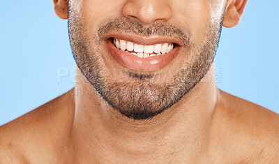 Buy stock photo Teeth, mouth and beard of a man with a smile for dental, health and wellness against a blue studio background. Healthcare, lips and face of a happy and clean model with results from care for tooth