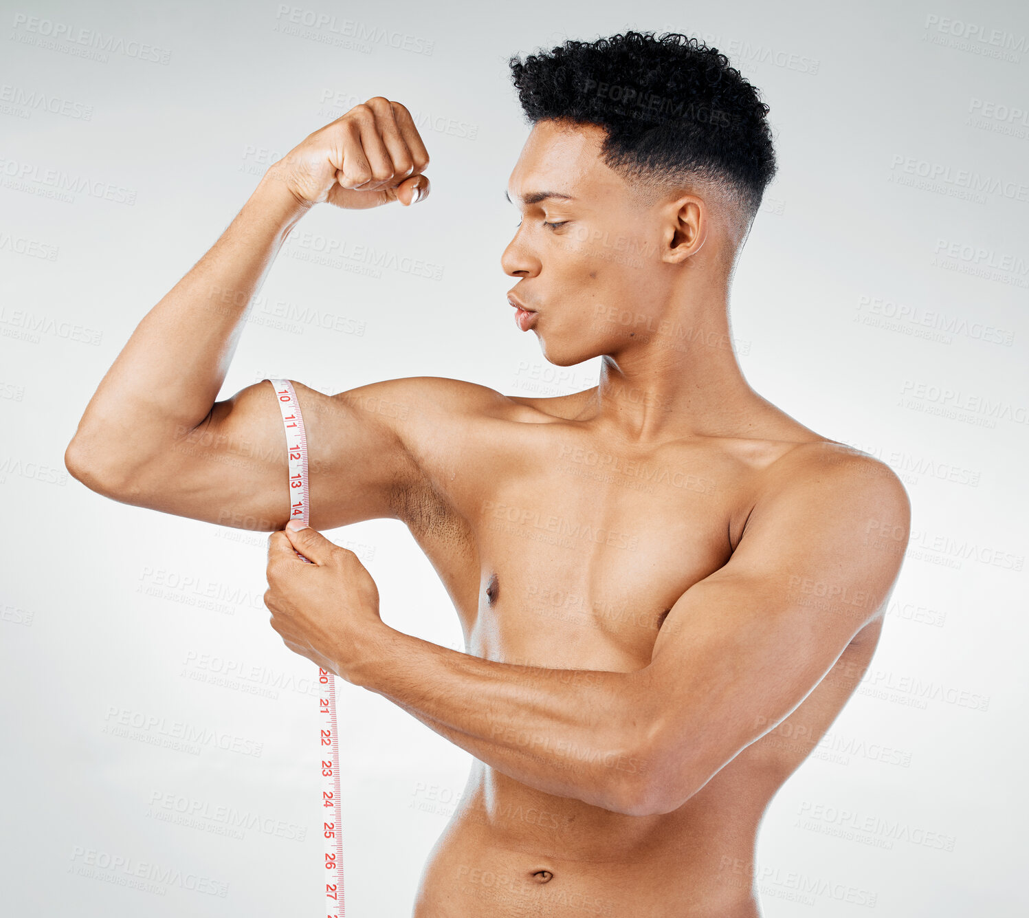 Buy stock photo Fitness, biceps and man with measuring tape on arm, check muscle growth and development in training exercise. Workout, gym and happy healthy bodybuilder measuring bicep muscles, health and wellness.