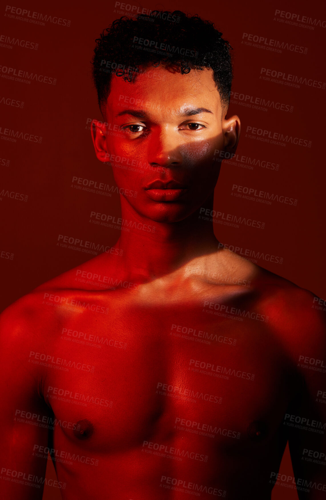 Buy stock photo Beauty, body and aesthetic of young man in studio with neon red light for skincare, exercise or fitness background. Portrait of male commitment to exercise, health and body wellness for inspiration