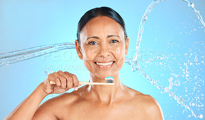 Buy stock photo Dental, toothpaste and senior woman brushing teeth with water splash, toothbrush or self care product for enamel healthcare. Oral wellness, dental care routine and elderly beauty model cleaning tooth