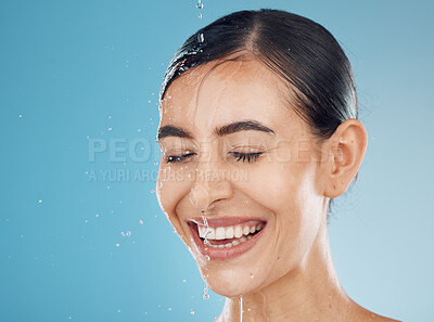 Buy stock photo Beauty splash, woman face and water for hygiene skincare, grooming health and wellness for a morning routine. Shower of a young model with cosmetic, natural beauty and facial wash happy with a smile 