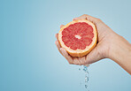 Grapefruit, food and wellness fruit juice of a woman hand with a healthy lifestyle. Model hands with fresh and organic produce for skincare, body and skin health with beauty and cosmetic treatment