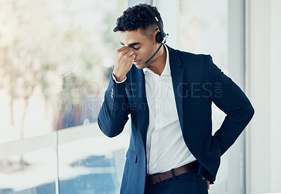 Buy stock photo Businessman, headache and call center in burnout, stress or depression for consulting or telemarketing at the office. Man in contact us, customer service or support suffering with mental health issue