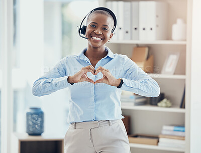 Buy stock photo Hand, heart and call center consultant in office showing love, trust and hope while working in crm management. Black woman, hands and thank you while consulting for customer service with excellence