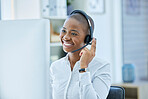 Call center, communication and consulting with black woman at desk for telemarketing, customer support and contact us. Phone call, 5g and kpi with employee at computer in office for crm and help
