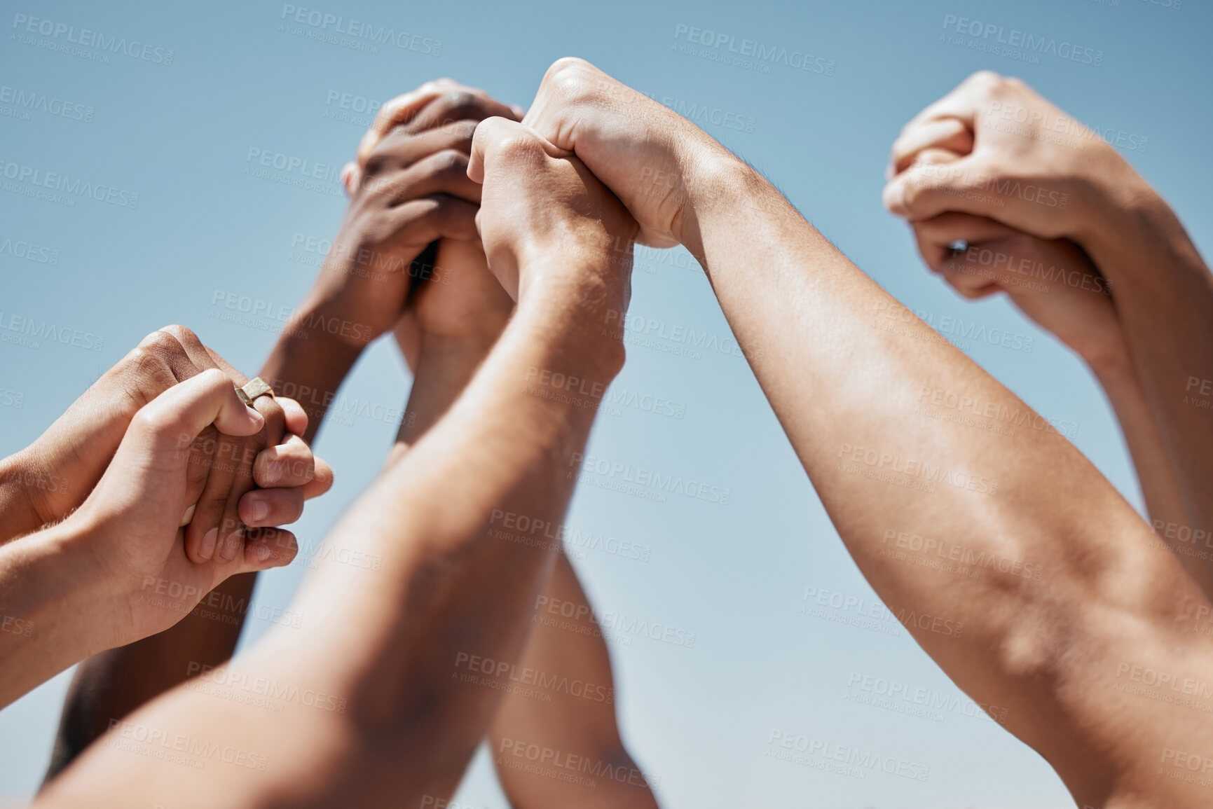 Buy stock photo Pray, hands and community praying against a blue sky background for worship, praise and religion outside. Prayer, church and hand of people united in support of love, peace and God by spiritual group