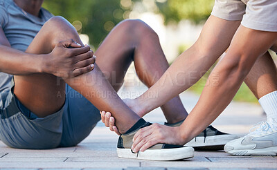 Buy stock photo Feet, hands and sports injury by fitness friends on the floor during exercise in the city, holding and hurt. Shoes, hand and ankle pain by sport people on ground for injury, muscle and foot problem