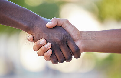 Buy stock photo Teamwork, fitness and handshake by hands in support of training, exercise and healthy lifestyle against bokeh background. Wellness, sports and friends shaking hands before a competitive game outdoors