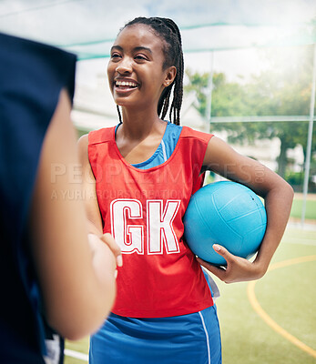 Buy stock photo Black woman, netball player and handshake on court in fitness game, workout match or training competition exercise. Smile, happy and sports women in welcome, thank you or good luck gesture in stadium