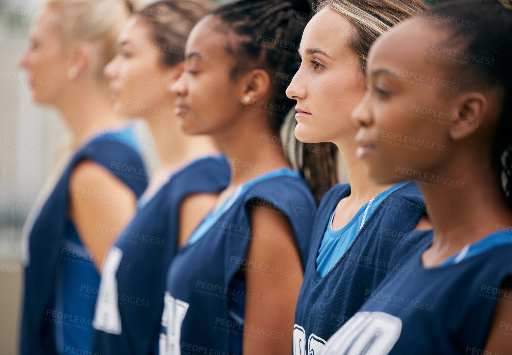 Buy stock photo Sports, Netball and team of women with motivation, focus and strong mindset stand in row. Collaboration, teamwork and support of professional team serious before competition game or training workout

