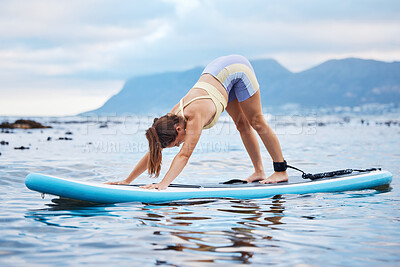 Buy stock photo Surfer woman, surfboard and stretching on water, beach or yoga practice for peace, wellness or calm. Female, surf and warm up seaside for workout, stretch or exercise outdoor for health or fitness