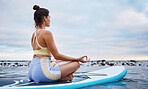 Woman, zen meditation and ocean yoga peace workout exercise for spiritual wellness, healing and soul mindfulness training. Sea breathing, meditate on water and surfer girl breathe for health balance
