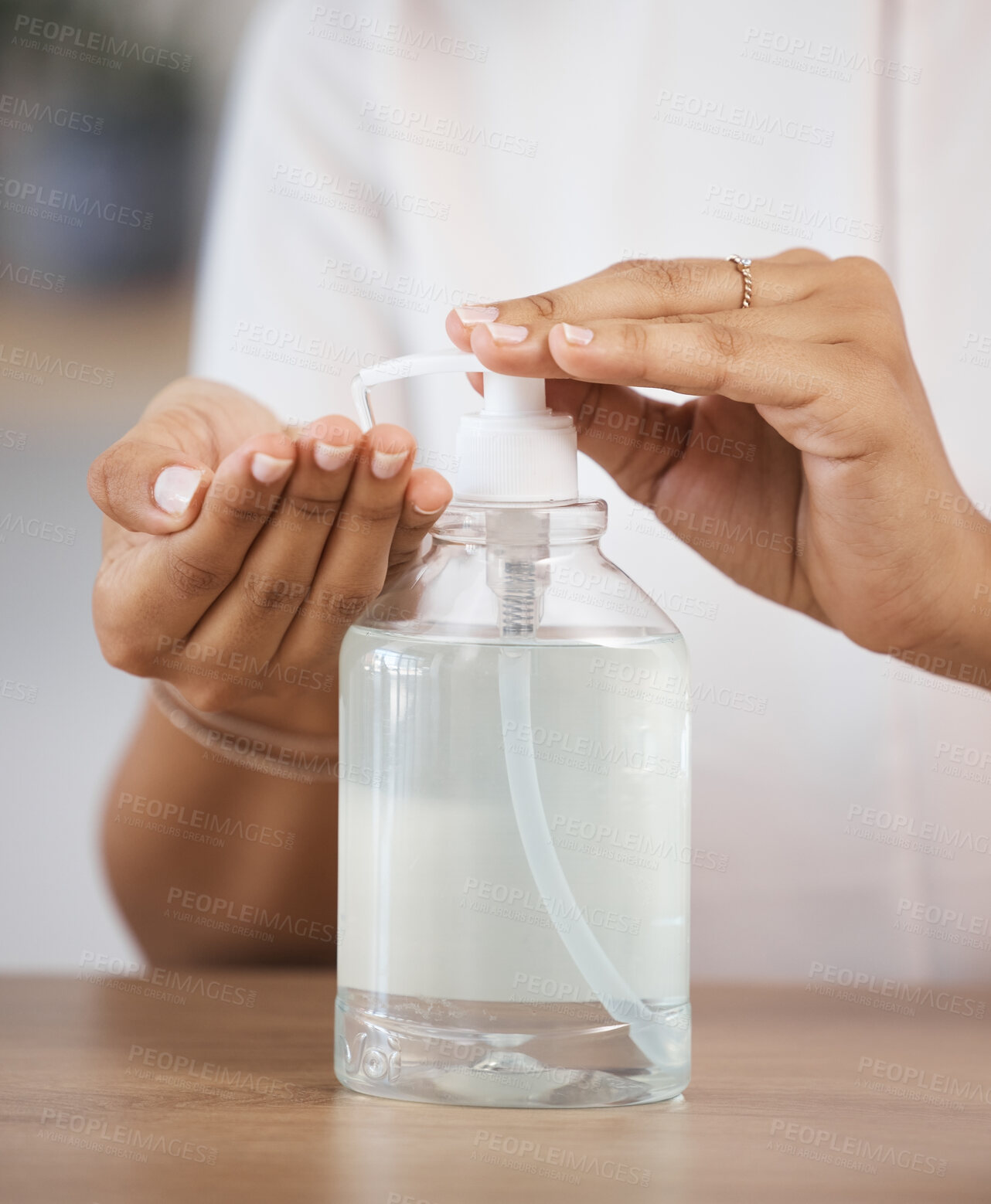 Buy stock photo Skincare, safety and hands cleaning bacteria with liquid soap for healthy protection and disinfection. Healthcare, wellness and woman pressing hand sanitizer bottle for hand washing dirty germs 