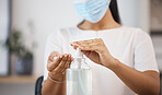 Covid, hands and woman with sanitizer to clean, disinfect and prevent covid 19. Hygiene, disinfection and girl with face mask and bottle of antibacterial alcohol gel for bacteria, germs and sickness