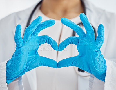 Buy stock photo Heart, medical and doctor with hands for support, love and healthcare while working at a hospital. Medicine, care and nurse with gloves and emoji sign for consultation, insurance and cardiology