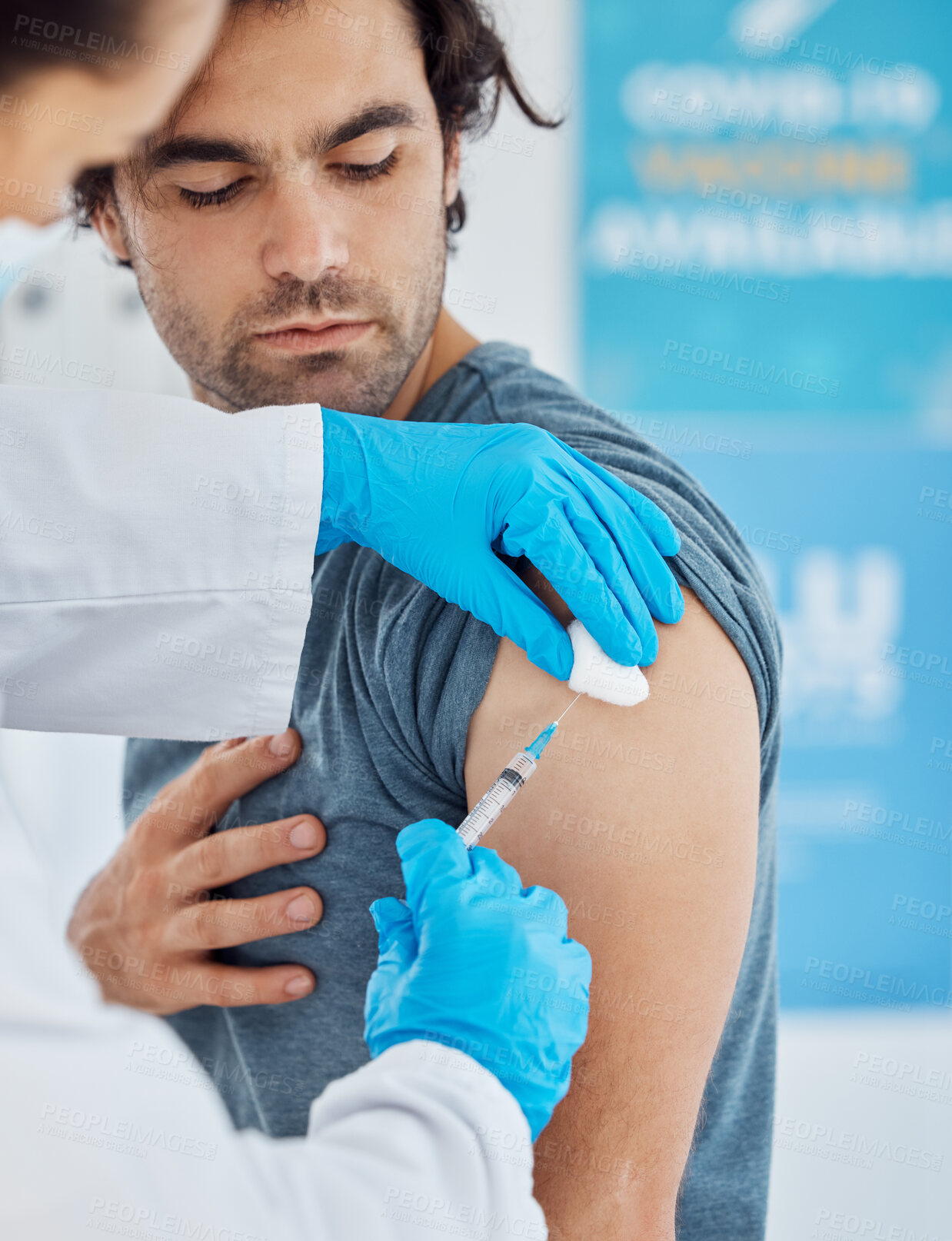 Buy stock photo Covid, vaccine and injection with a man patient getting his booster shot in a hospital with a doctor in gloves. Medicine, health and insurance with a male in a clinic to boost his immune system