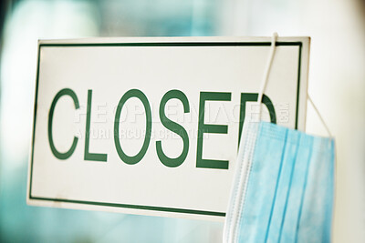 Buy stock photo Closed sign, business and covid crisis background at store, shop of company during compliance, lockdown and bankruptcy. Office window with covid 19 ppe mask and information notice during lockdown