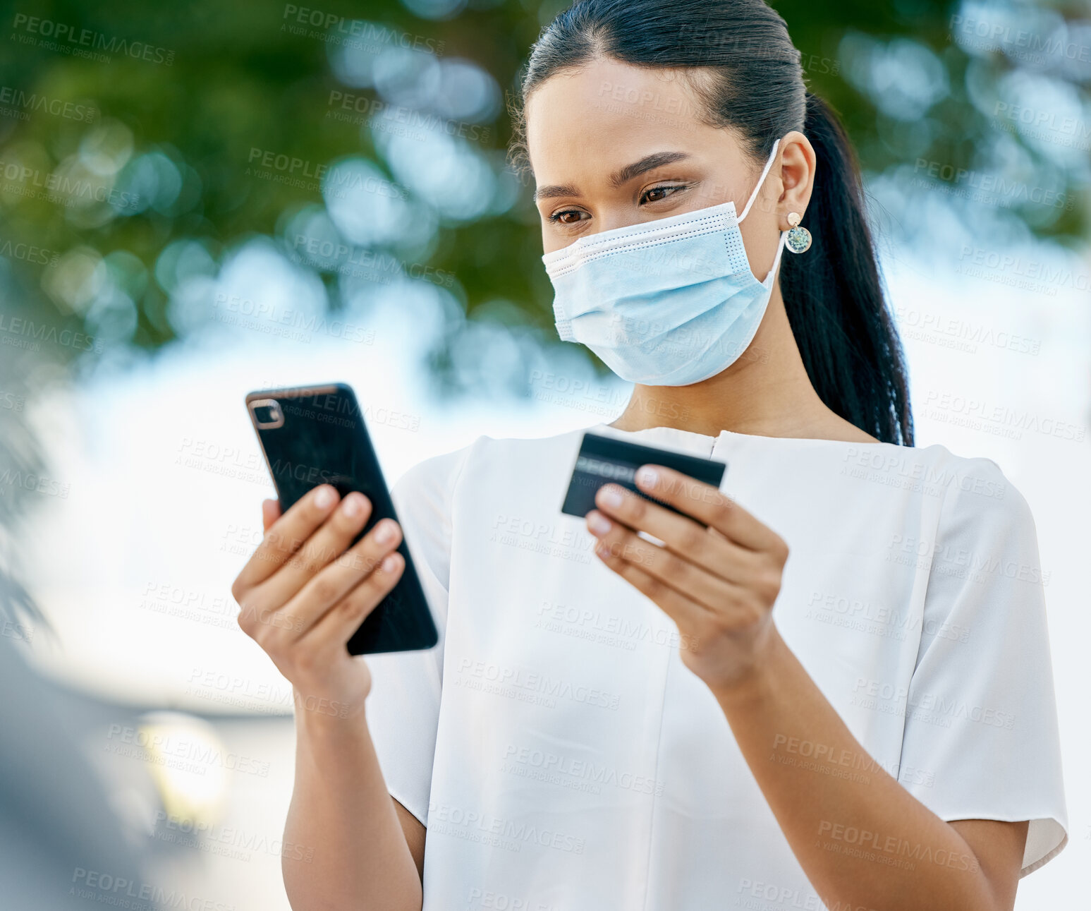 Buy stock photo Covid, phone and woman in face mask with a credit card for a payment or to send cash on a digital application. Coronavirus, finance and healthy girl customer busy online shopping and money transfer