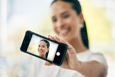 Buy stock photo Phone, selfie and screen with a woman taking a photograph on her smartphone for social media. Face, portrait and headshot with a female posing for a picture using wireless mobile technology alone