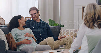 Buy stock photo Pregnancy, smile and couple in therapy with a therapist for support, help and planning for baby in an office. Consulting, happy and man and woman talking with a psychologist about being pregnant