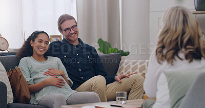 Buy stock photo Happy, counseling and couple with a psychologist in an office for a therapy session together. Happiness, pregnant woman and her husband talking to a professional family therapist with a smile.