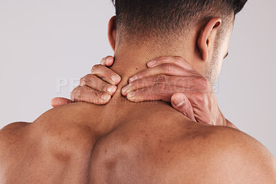 Buy stock photo Injury, neck and hands of man in pain feeling muscle tension, inflammation and spine for treatment marketing. Accident, problem and physical trauma of person in grey studio with mockup.
