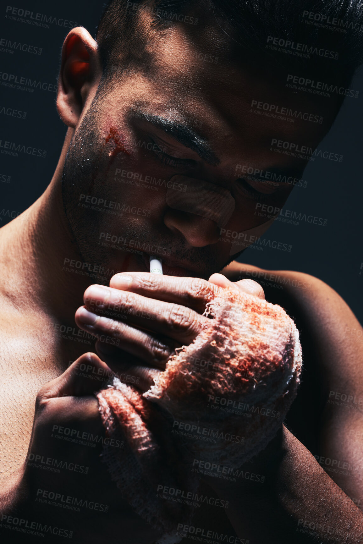 Buy stock photo Fighter, boxer blood and man smoking a cigarette after a exercise fight, match and training. Smoke of a hurt fighting athlete with a bleeding hand injury and workout medical accident from boxing