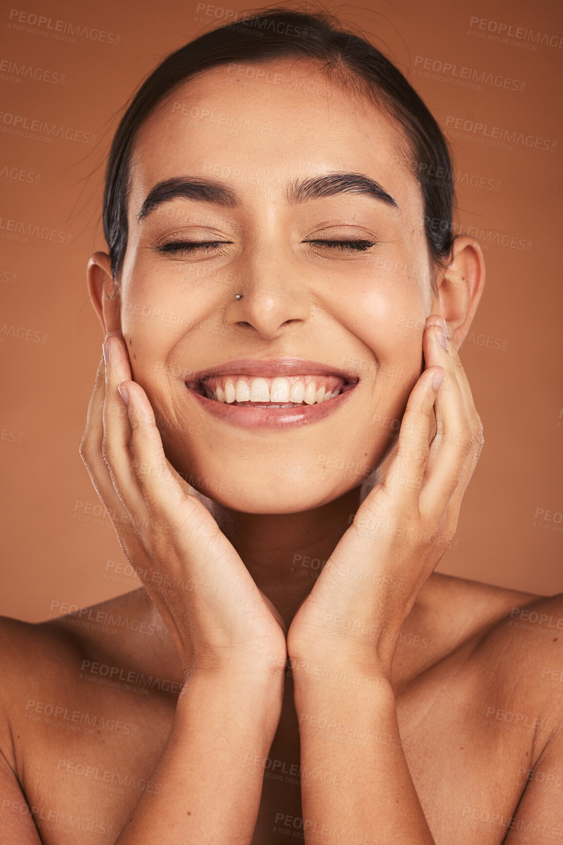 Buy stock photo Cosmetics, young woman face and smile being happy, pride and confident with brown studio background. Skincare, girl and body care for natural beauty, organic facial and smooth skin for clear face.