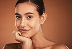Makeup, skincare and portrait of a woman with a smile for cosmetics against a brown mockup studio background. Face of a happy, luxury and cosmetic model with wellness, beauty and care for skin