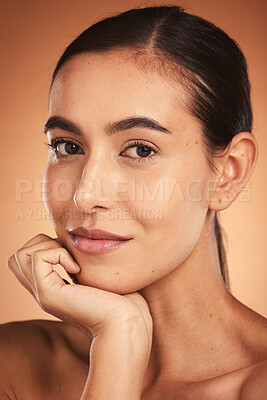 Buy stock photo Beauty, makeup and latino woman in a studio with mockup for wellness, skincare and health in orange background. Portrait, cosmetics model and cosmetic, facial care and clear skin, relax aesthetic