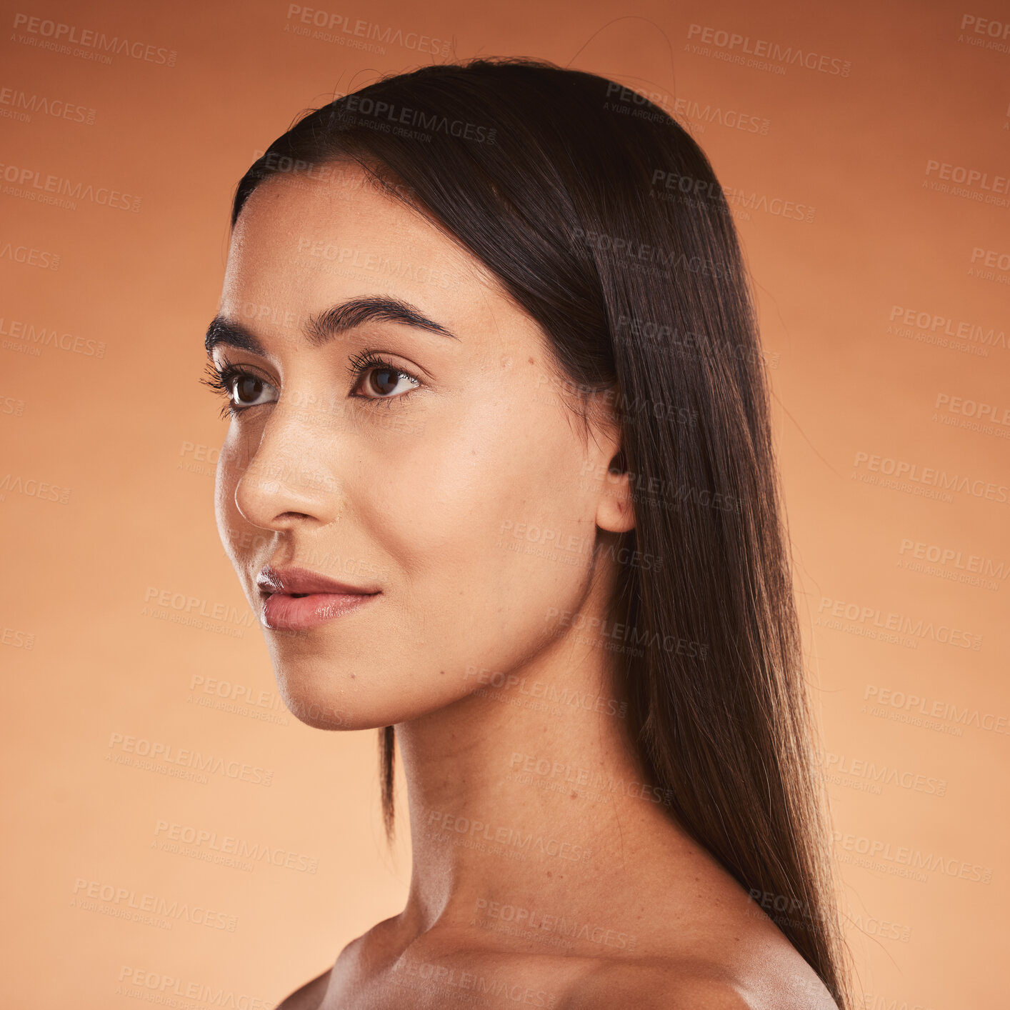 Buy stock photo Woman, silky hair and face beauty wellness lifestyle or luxury skincare. Young aesthetic model, natural cosmetic haircare or makeup, calm facial expression and vision look in orange background studio
