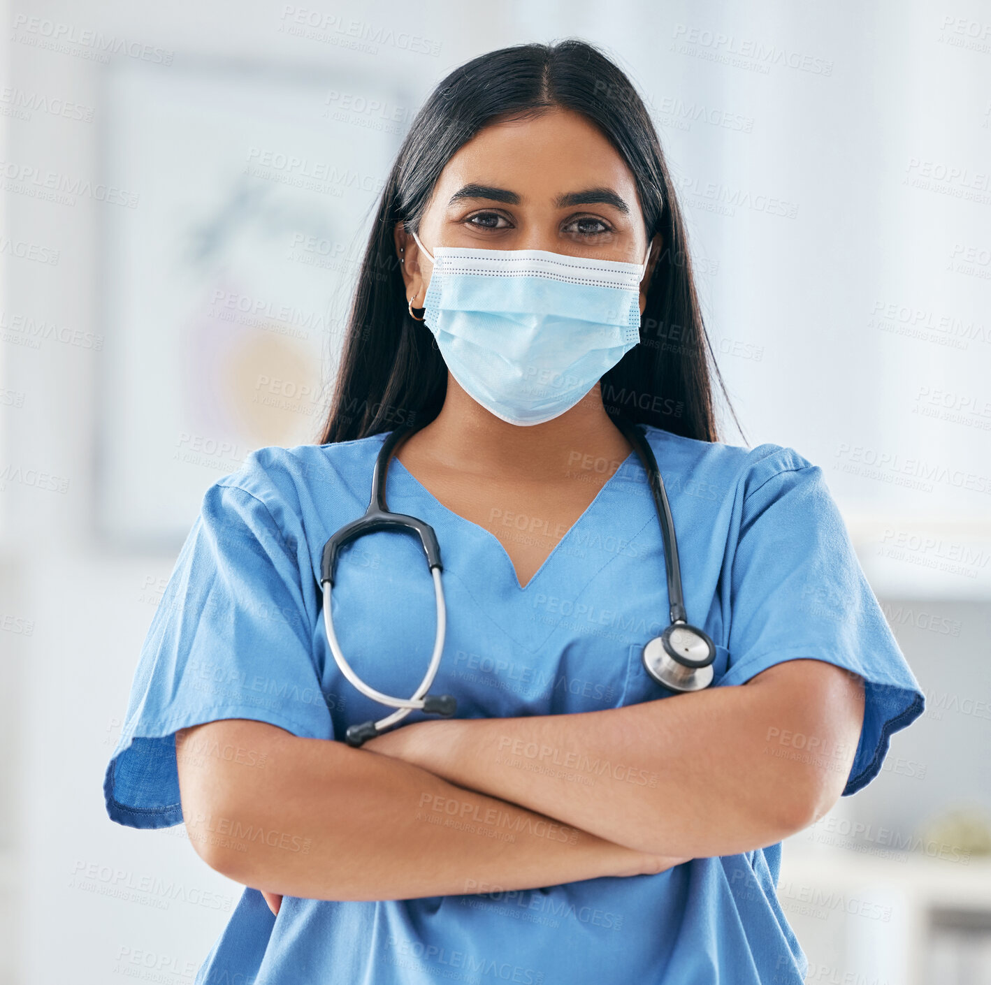 Buy stock photo Nurse, doctor and covid face mask in hospital with motivation, confidence and arms crossed. Health expert or medical worker with support in the covid 19 pandemic, healthcare and safety from virus