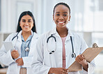 Healthcare, women and doctors with patient chart on clipboard in hospital or clinic. Happy black woman doctor, medical partnership and insurance documents, diversity and leadership in health care.